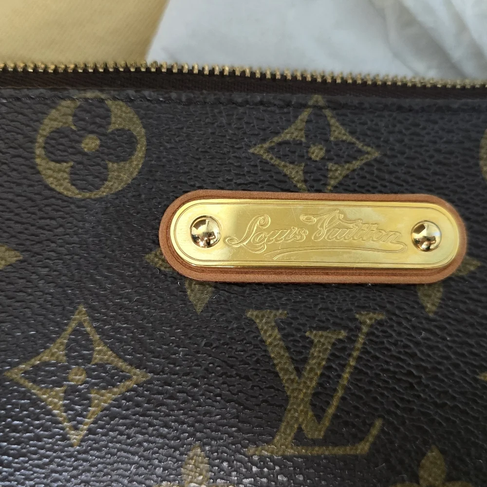 Authentic Louis Vuitton Eva Monogram Clutch - Picture 2 of 10